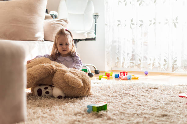 istock Playful baby girl 1391886508