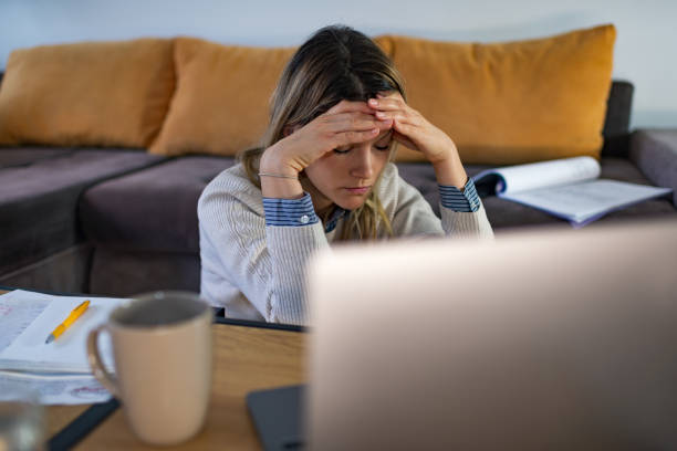 istock Depressed woman working from home 1391888604