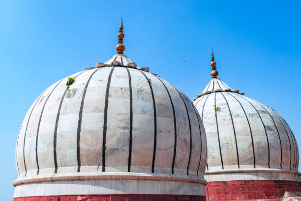 istock ancient mosque vintage dome with bright blue sky at morning from unique angle 1391890378