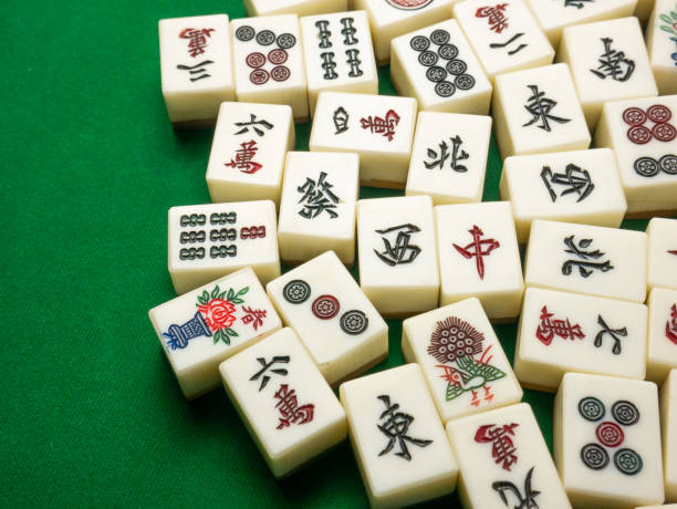 istock The mahjong on table ancient asian board game close up image 1391892703