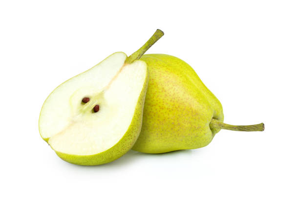 Pear fruit on white Closeup fresh pear fruit with cut in half sliced isolated on white background. pear stock pictures, royalty-free photos & images