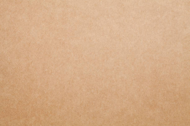 istock Sheet of brown kraft paper texture background 1391896978