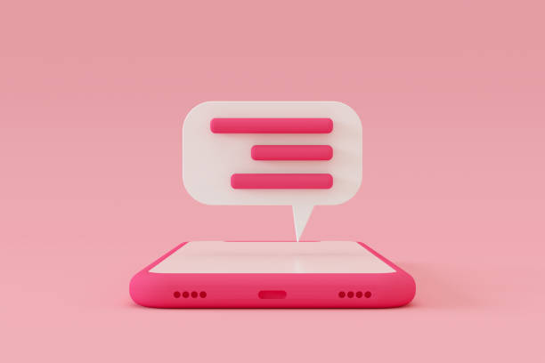 istock Chat speech bubble on smart phone screen pink color background 1391898615
