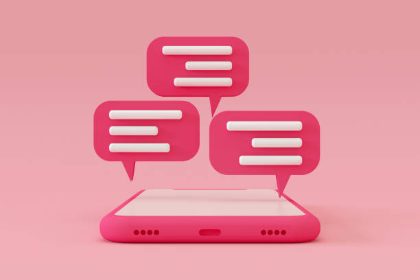 istock Chat speech bubble on smart phone screen pink color background 1391899715