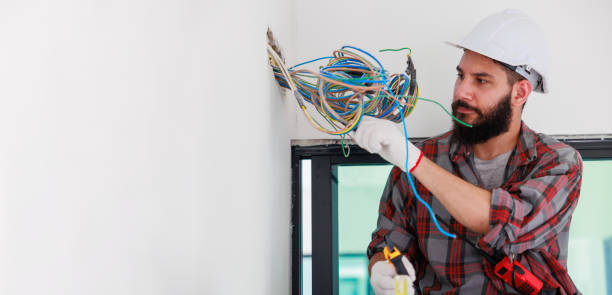 istock Hispanic male Electrician engineer installer with a tool in his hands. Maintenance service Repair and handyman concept 1391903252