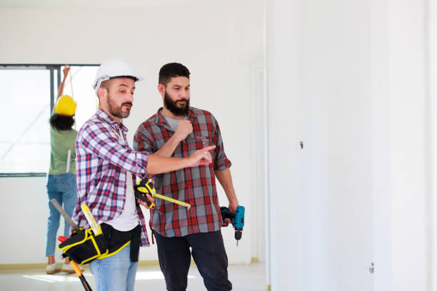 istock Two construction engineer man team in  safety uniform working and  planing in construction site. Maintenance service Repair and handyman concept 1391903343