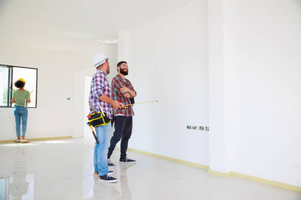 istock Two construction engineer man team in  safety uniform working and  planing in construction site. Maintenance service Repair and handyman concept 1391903358