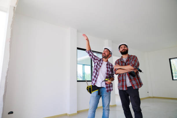istock Two construction engineer man team in  safety uniform working and  planing in construction site. Maintenance service Repair and handyman concept 1391903382
