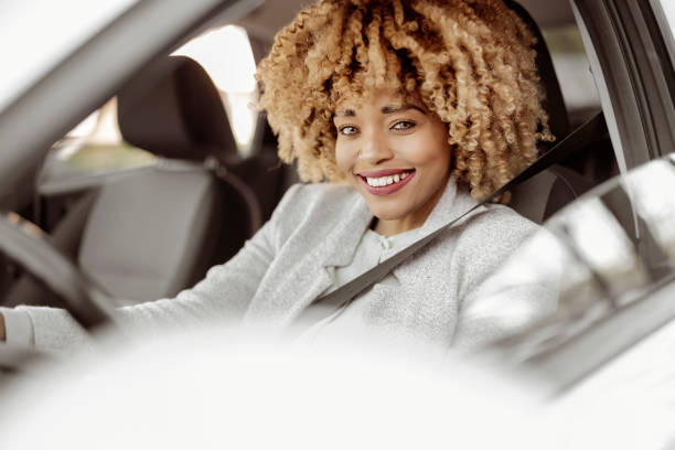 istock African American Female Driver Looking at Camera 1391903837