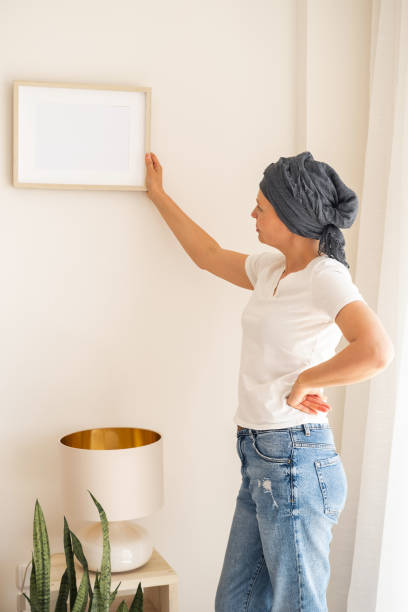 istock A wooden frame with empty space in women's hands 1391906697