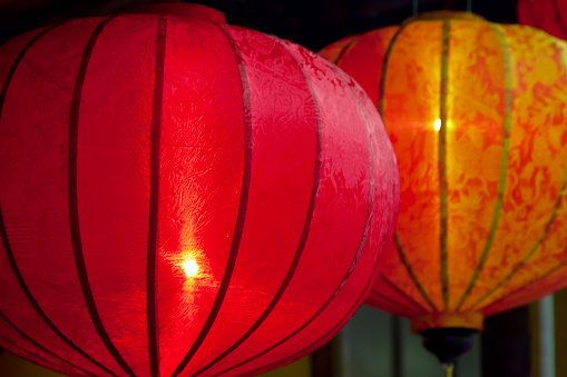 Glowing red decorative Chinese lanterns, side view