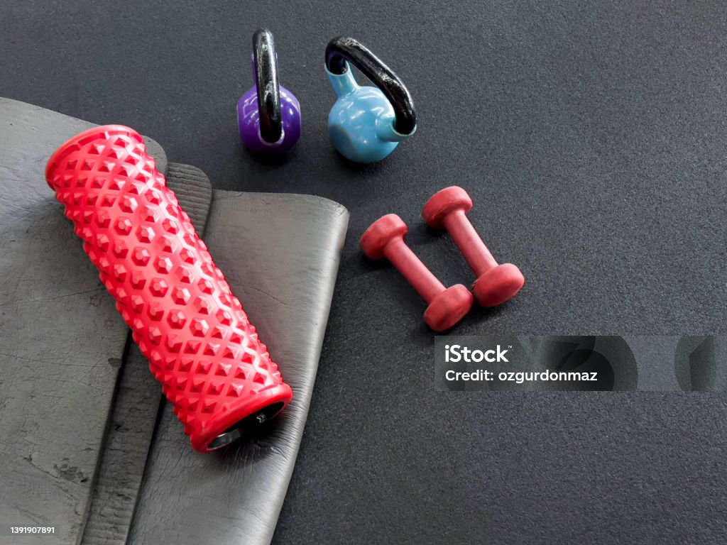 Gym and workout equipments in fitness  center Barbell Stock Photo