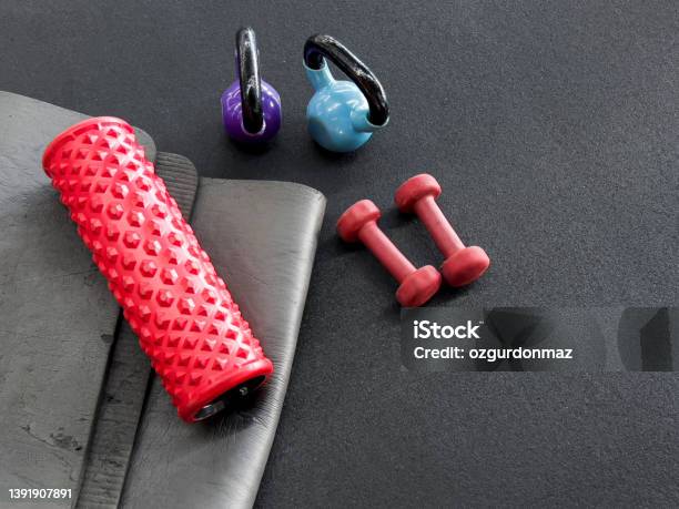 Gym And Workout Equipments In Fitness Center Stock Photo - Download Image Now - Barbell, Note Pad, Abstract