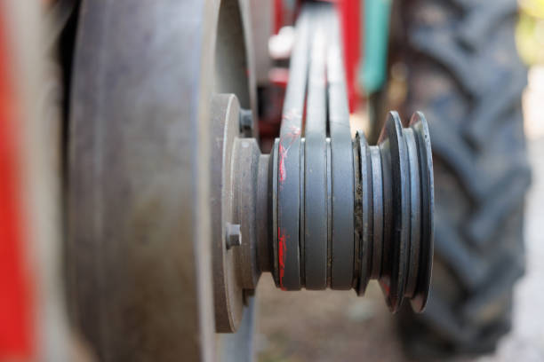 Agricultural machine car part. Pulley and belt transmission.