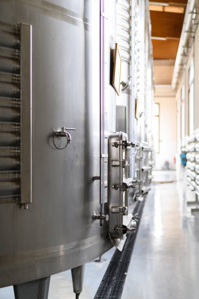 istock Steel wine tanks for wine fermentation at a winery 1391912603