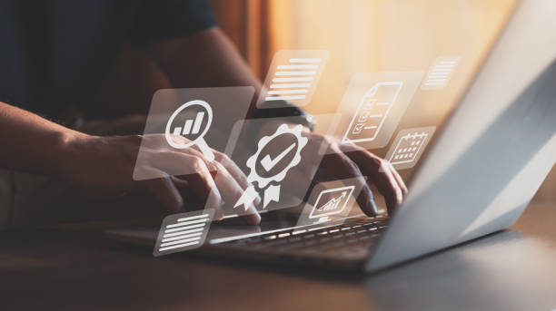 istock Businessman operating with the quality assurance, guarantee, standards, ISO certification, and standardization notion as a proof of top service. 1391915086