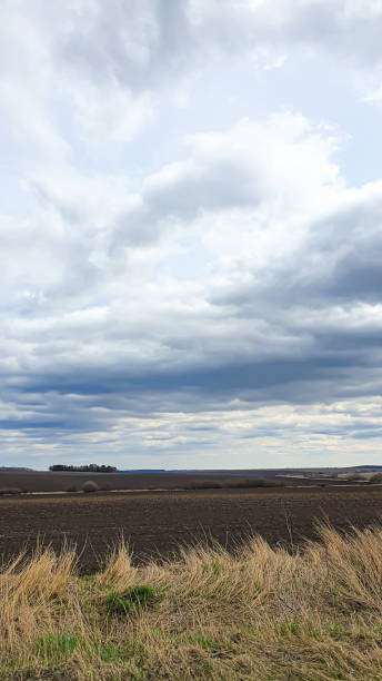 istock Blue sky with clouds. Road, exit from the occupied territories. War in Ukraine. Escape from the aggressor. 1391918594