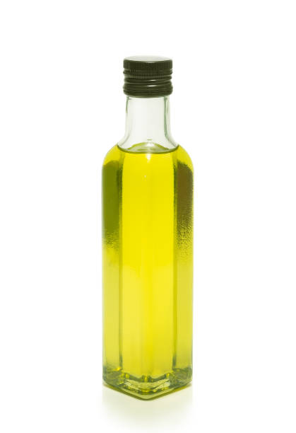 istock cooking olive oil glassy bottle, isolated 1391918727