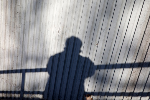 silhouette of a person on  wall