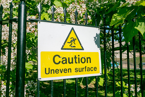 Caution Uneven Surface Sign at Rochester in Kent, England