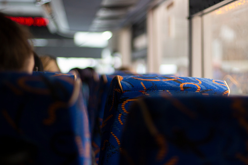 Seats on the bus. Places on public transport. Seat backs in the bus.