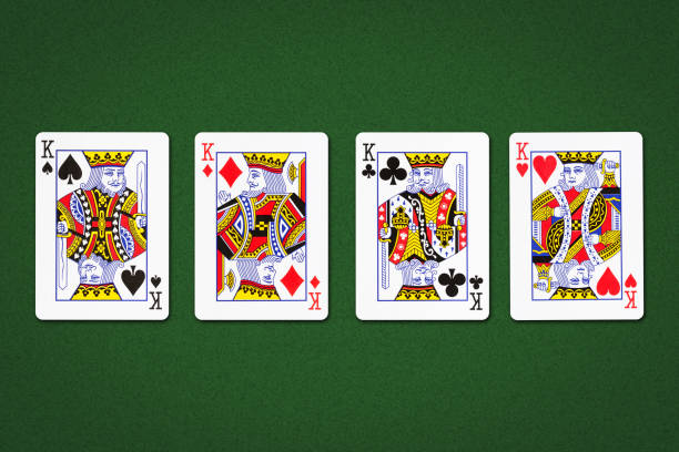 istock Four kings, on a green background. Gambling. 1391922262