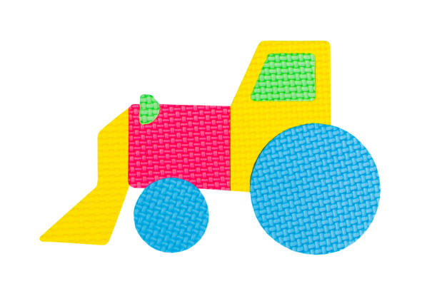 istock Image of colored tractor, toy on white background 1391926119