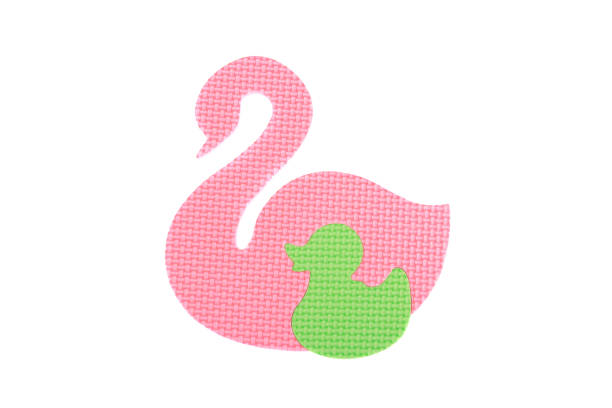 Image of colored Swans, toy on white background