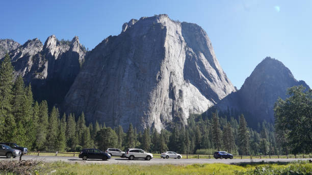 El Capitan and Half Dome granite monolith mountain peaks in the Yosemite National Park of California, USA. stock photo