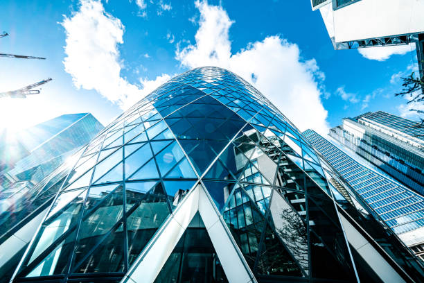 Looking directly up at the skyline of the financial district in central London Looking directly up at the skyline of the financial district in central London central london skyline stock pictures, royalty-free photos & images