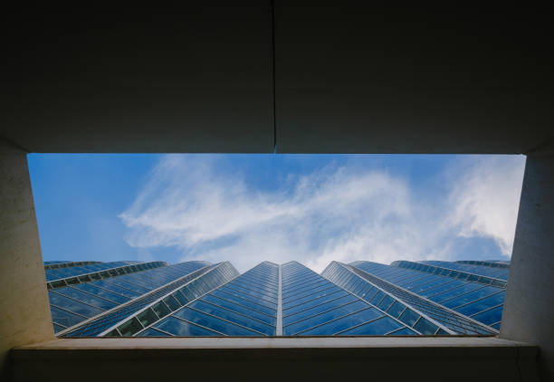 istock Abstract forms, shapes, lights and reflections in architecture during sunset in city 1391933434