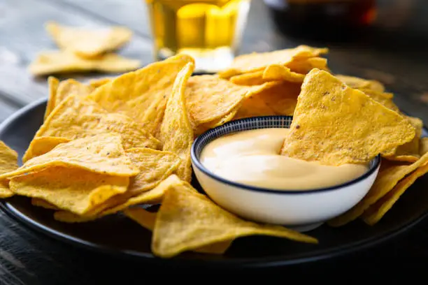 Mexican nacho chips with cheese sauce
