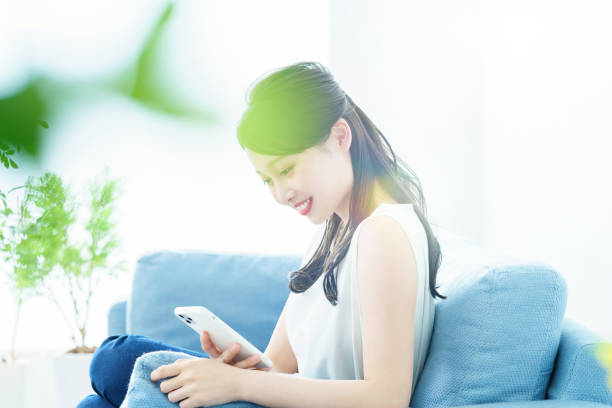 istock A woman operating a smartphone 1391938548