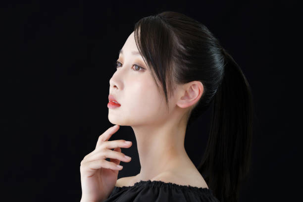 istock A young woman with a hand on her face 1391939559