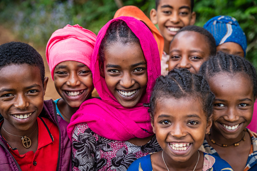 Group of happy African children from remote village in Central Ethiopia, East Africa.