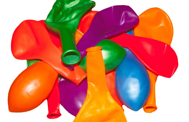 istock not inflated colorful balloons on white 1391942747