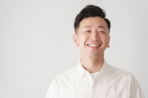 Smile middle man in white shirt and white background