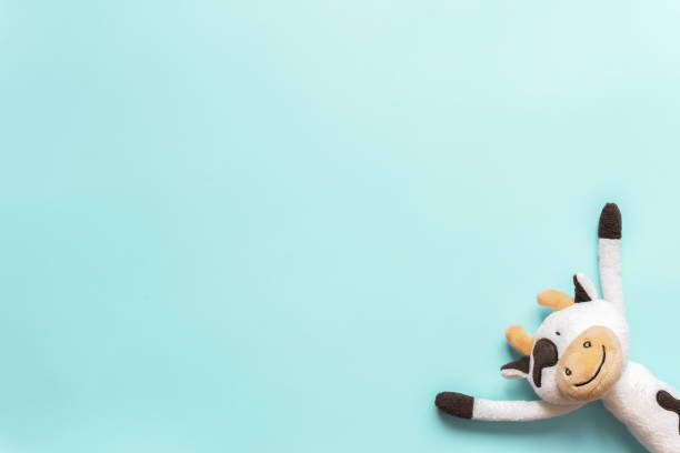 istock funny toy on turquoise background 1391944295