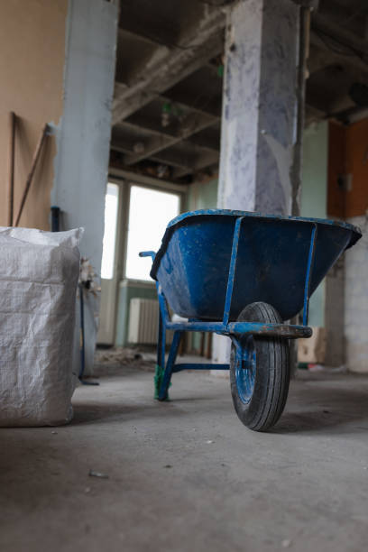 istock Wheelbarrow in a room waiting for renovation 1391946521