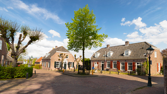 Characteristic houses around the church in the old part of the Dutch village of Soest in the Netherlands.