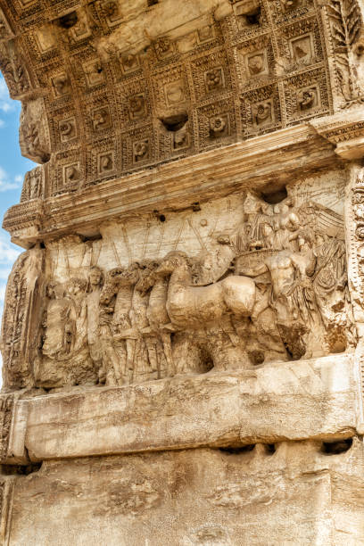 detail of ancient arch of titus at roman forum, rome, italy. - arch of titus imagens e fotografias de stock