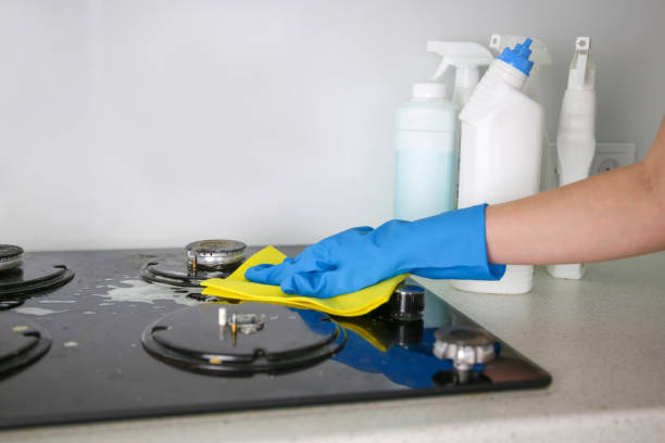 istock A woman cleans the gas stove from dirt. 1391952839