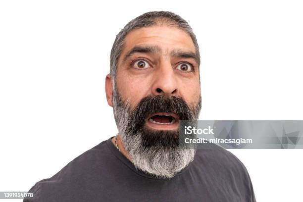 Mature Handsome Man Over Isolated Background Afraid And Shocked With Surprise Expression Fear And Excited Face Stock Photo - Download Image Now