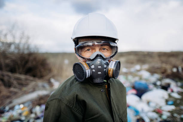 The portrait of woman using a protective suit for breathing in an environmental pollution