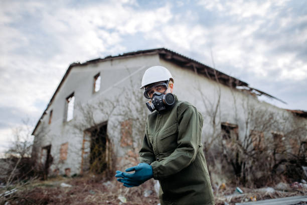 istock The ecologist wearing rubber gloves for protection 1391954326