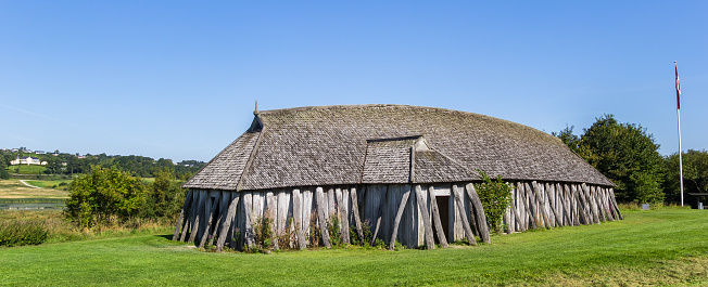 Panorama of the recontructed Viking longhouse of Fyrkat near Hobro, Denmark