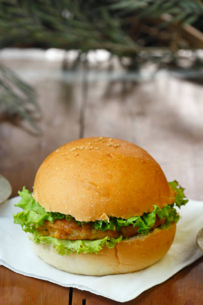 Home made Aloo Tikki burger with lettuce and sauce