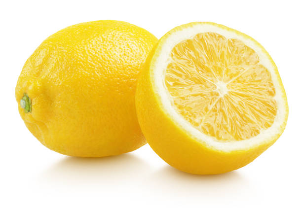 istock Yellow lemon citrus fruit with half on white 1391966814
