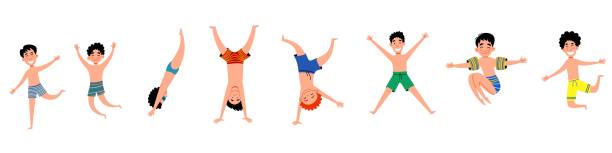 istock a set of happy children. Boys in bathing suits. 1391967167