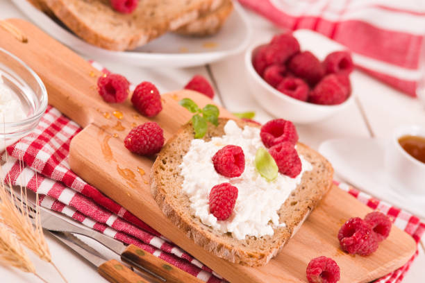 istock Rye bread with cottage cheese and raspberries. 1391967870
